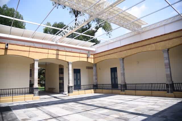 Art museum courtyard with canopy for upscale cocktail hours and networking events.
