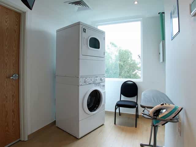 Improvised breakout room and laundry facility in a Mexico City hotel, ideal for site inspections.