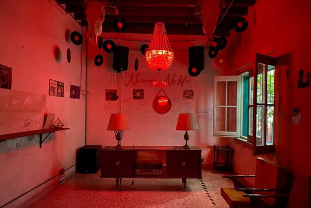 Rooftop Casa Ribera with red lighting for intimate brand activation or social gathering.