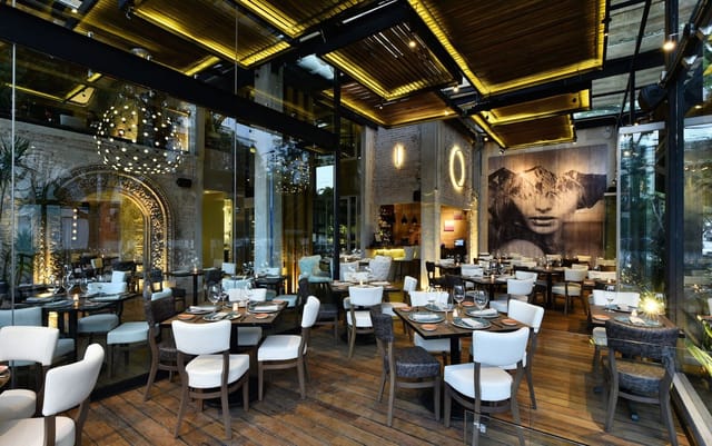 Chic private dining secret garden for corporate dinners and stylish networking events.