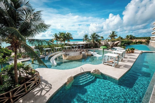 Luxury poolside venue at Palmaïa wellness resort for corporate retreats and networking events.