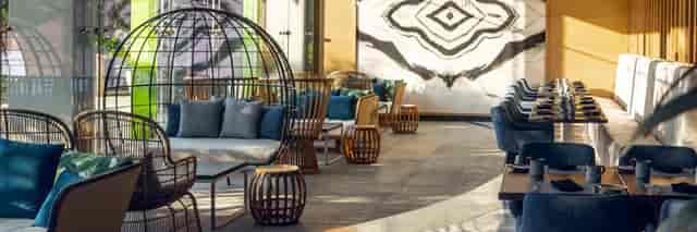 Lounge seating in Palmaïa, The House of AïA for corporate events and luxury networking.