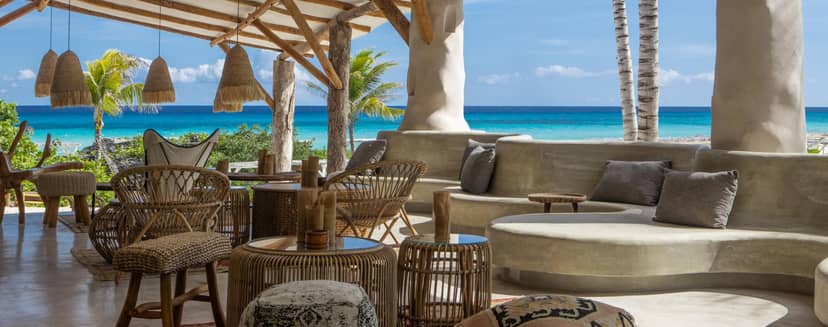 Open-air breakout space at Palmaïa with ocean views for luxury incentive travel and networking.