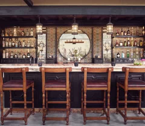 Tunki Rooftop bar with wooden stools for VIP reception or luxury networking event.