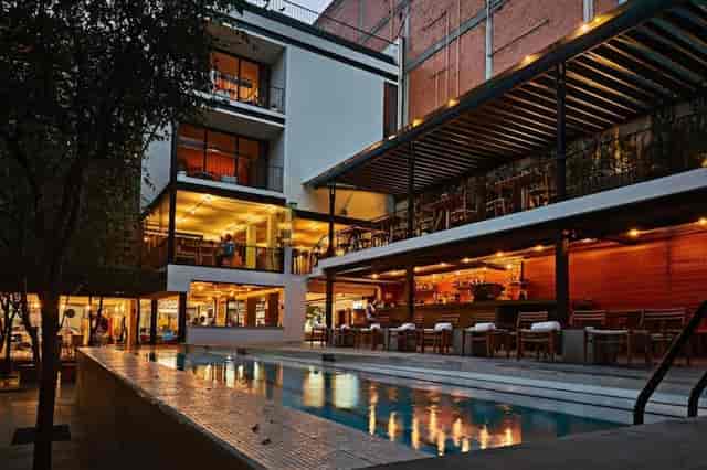 Biblioteca boutique venue in Hotel Carlota for corporate reception and networking cocktail event.