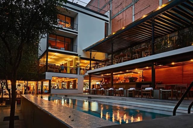 Biblioteca boutique venue in Hotel Carlota for corporate reception and networking cocktail event.