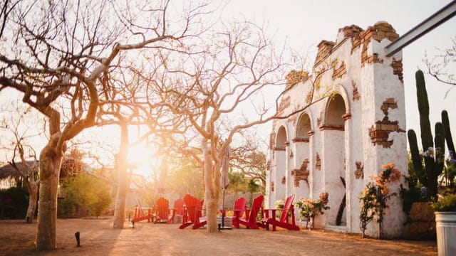 Desert-chic restaurant bar with architectural ruins, ideal for incentive event photography.
