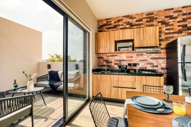 ULIV Roma Norte VIP suite with kitchenette for executive networking and private events.