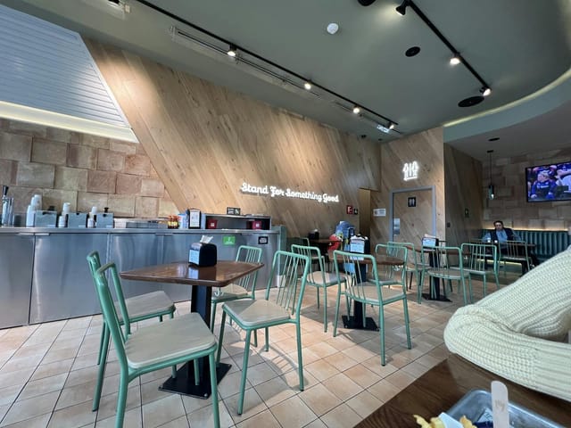 Modern Shake Shack Miyana interior for casual team huddle or networking event.