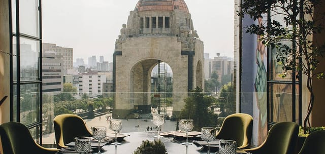 Legado Terraza restaurant venue with Monument to the Revolution backdrop for corporate events.