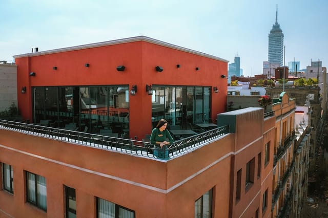 Urban rooftop venue with skyline views for corporate networking and cocktail events.