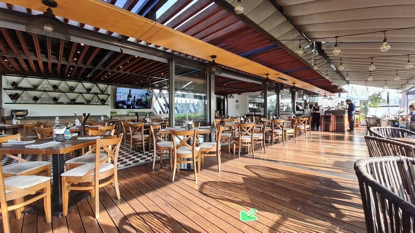 Retractable roof terrace at Domingo Santo Hotel for corporate networking and cocktail events.