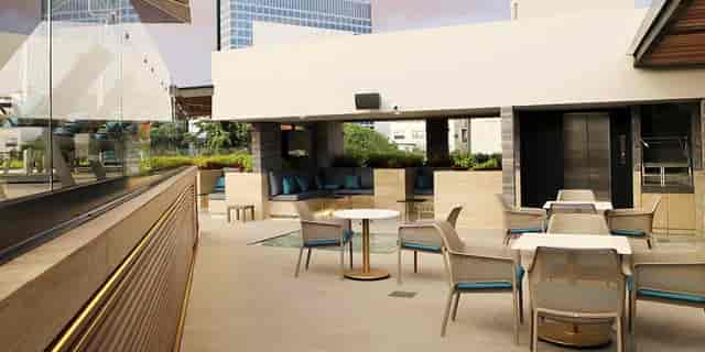 Alia Inn Boutique rooftop terrace with lounge seating for outdoor events and social gatherings.