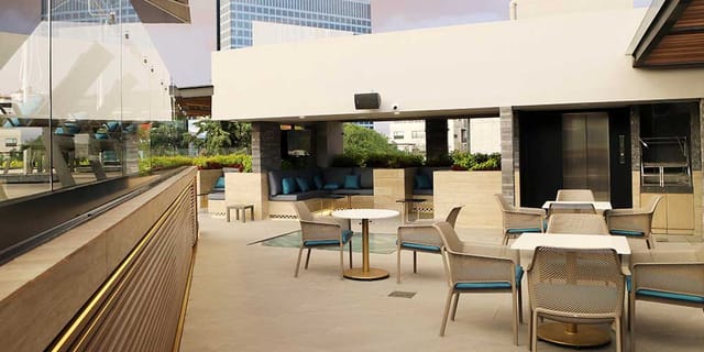 Alia Inn Boutique rooftop terrace with lounge seating for outdoor events and social gatherings.