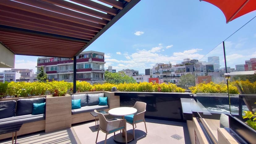 Alia Inn rooftop terrace with lounge seating for networking events and VIP corporate receptions.