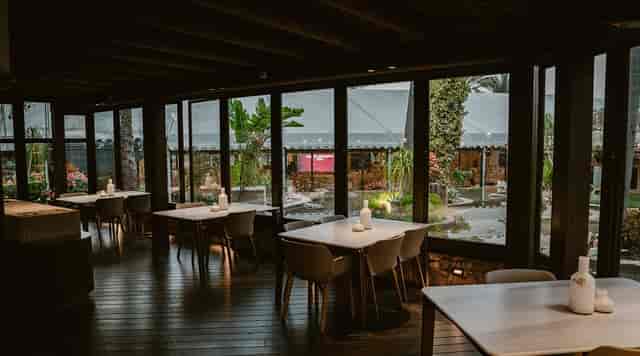 Boutique dining at Buena Vista Resort: modular tables in an intimate indoor-outdoor event space.