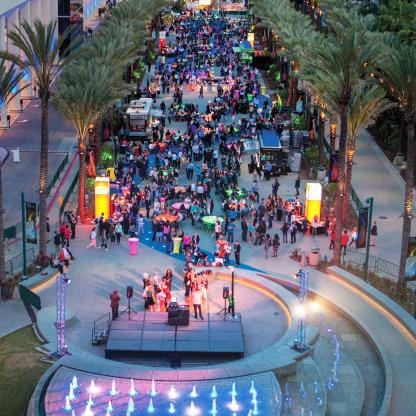 Gold Rush Camp outdoor festival stage and food truck networking event at Knott's Berry Farm.