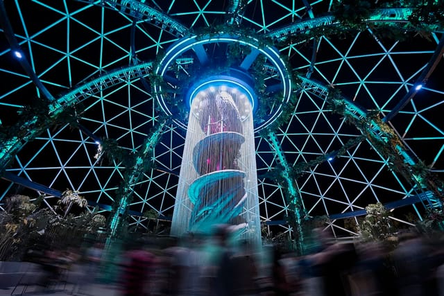Geodesic UNVRS terrace with immersive lighting for corporate gala and tech product launch events.