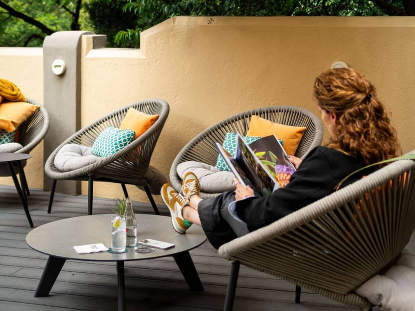 Casa Malí rooftop patio with lounge seating for corporate events and networking.