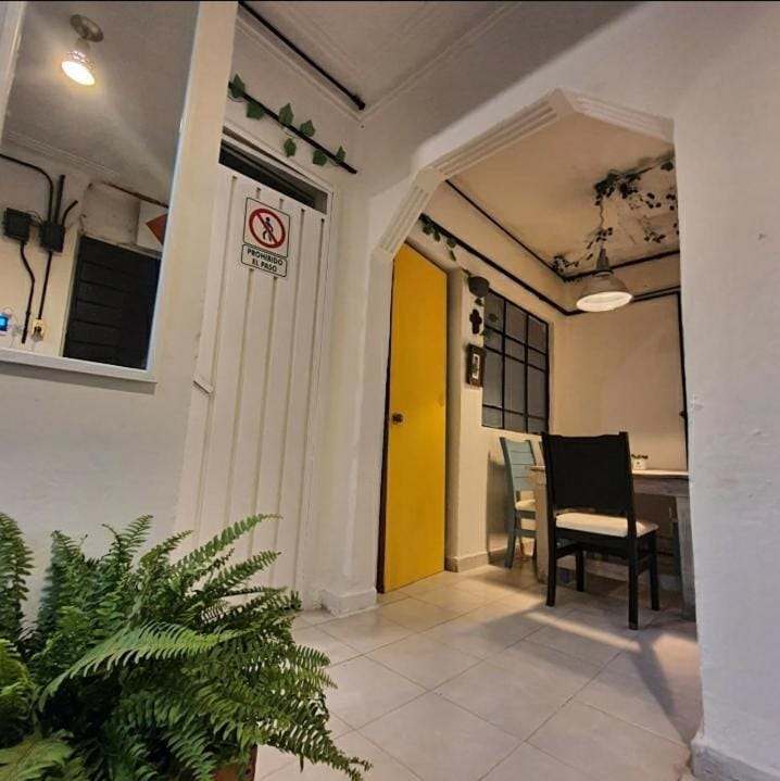 El Hostalito Del Valle workshop space with industrial decor for intimate private consultations.