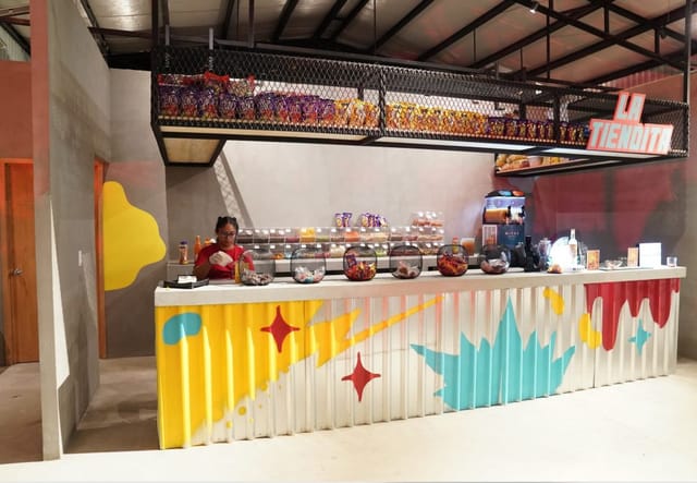 Branded pop-up snack stand at Club del Patio Roma for immersive event engagement.