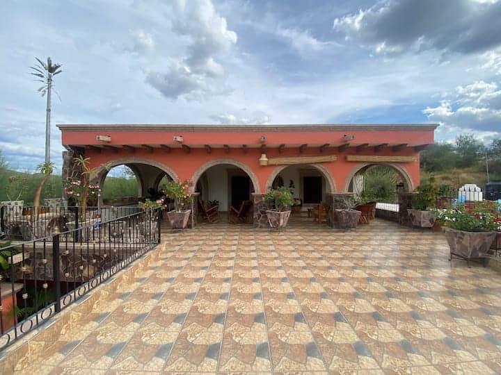 Rustic open-air venue at Terraza Álamos for intimate wedding receptions and cocktail hours.