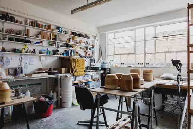 Creative desk space with natural light, perfect for workshops and team-building events.