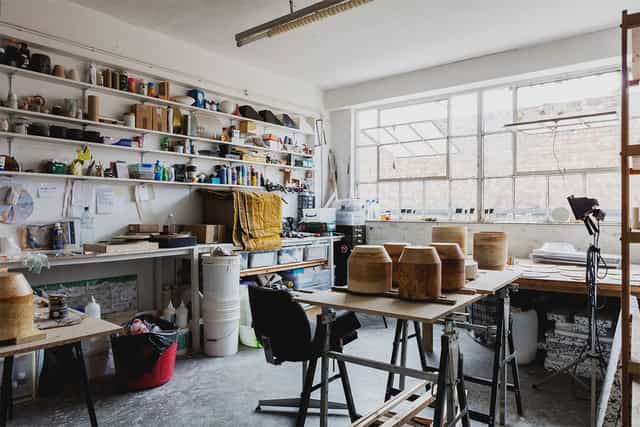 Creative desk space with natural light, perfect for workshops and team-building events.