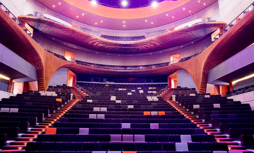 Tiered Centro Cultural Carranza auditorium for large keynote sessions and award ceremonies.