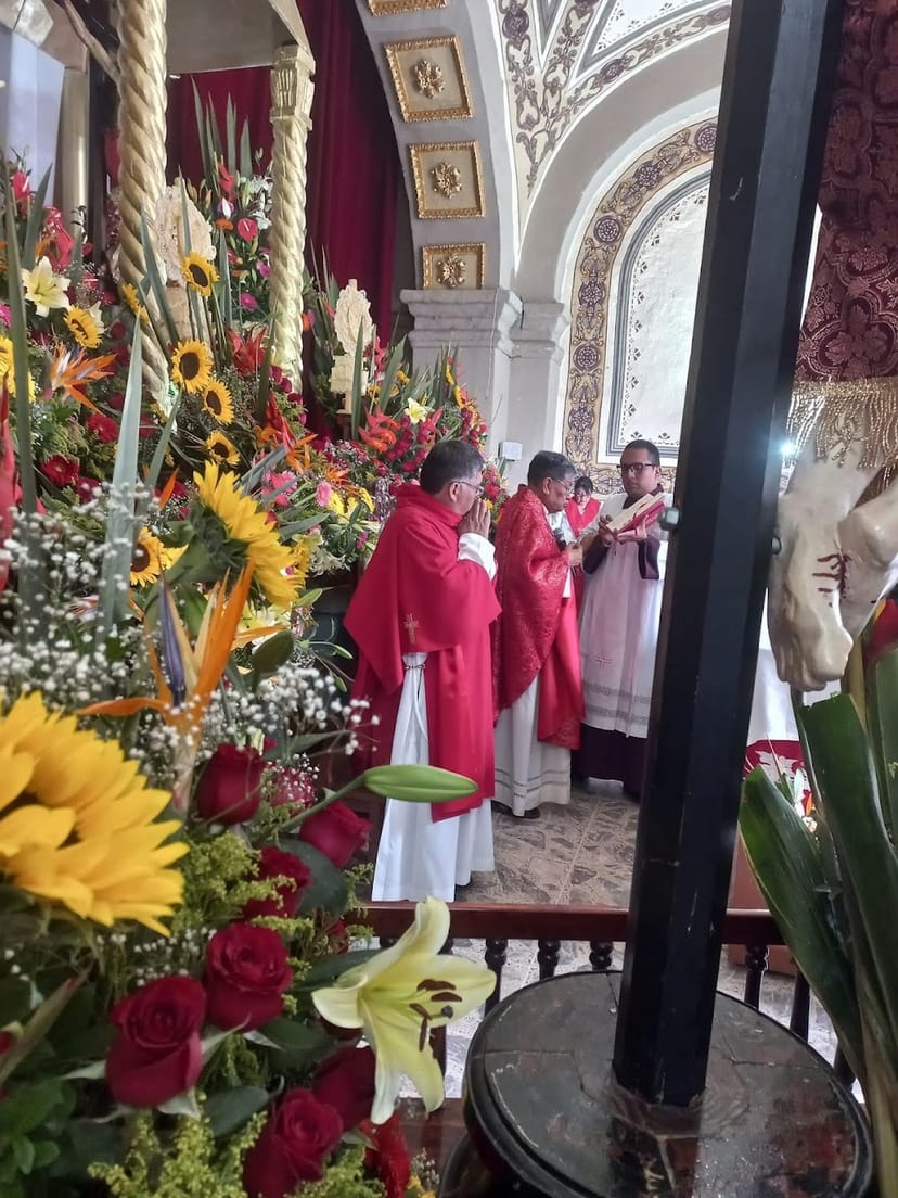 Floral installation at San Antonio de Padua church for wedding ceremony decor.