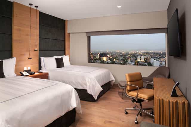 Presidente InterContinental Mexico hotel room, business workspace for conference travel.