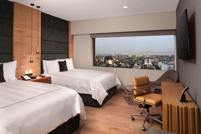 Presidente InterContinental Mexico hotel room, business workspace for conference travel.