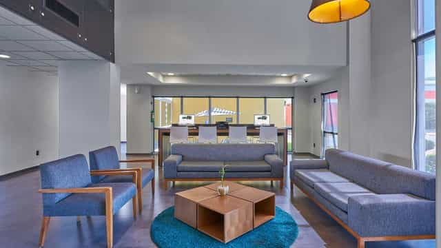 Modern hotel meeting room at City Express Marriott for corporate events and business networking.