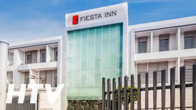 Fiesta Inn Plaza Central Aeropuerto: modern hotel exterior for business meetings and travel.