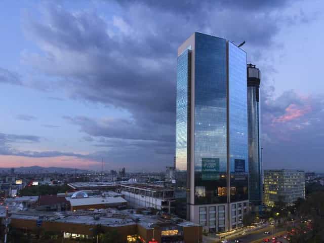 Mitikah high-rise corporate venue with professional meeting space for business conferences.
