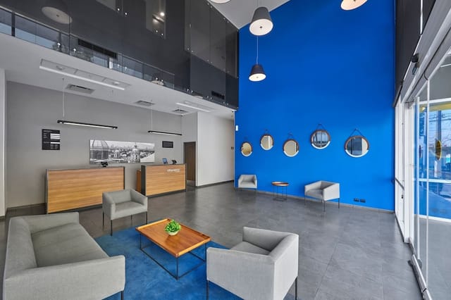 Modern conference registration lobby at City Express Ciudad de México La Villa for event meetings.