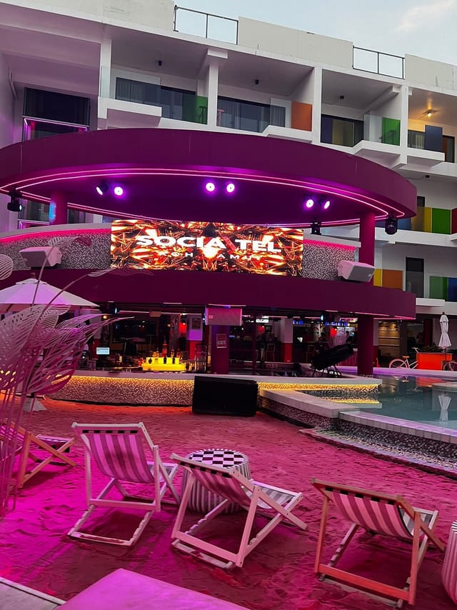 Socialtel poolside restaurant with LED lighting for corporate networking and brand events.