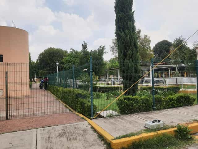 Outdoor stage at Faro Iztacalco with perimeter fencing, event venue planning and site logistics.