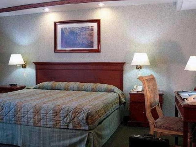 Hotel room in Lindavista, Mexico City: functional workspace for business conference lodging.