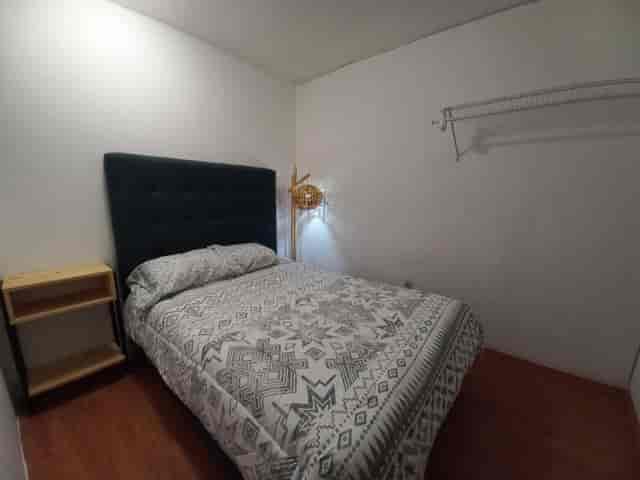 Minimalist budget room in Lindavista, Mexico DF for affordable business travel and event lodging.