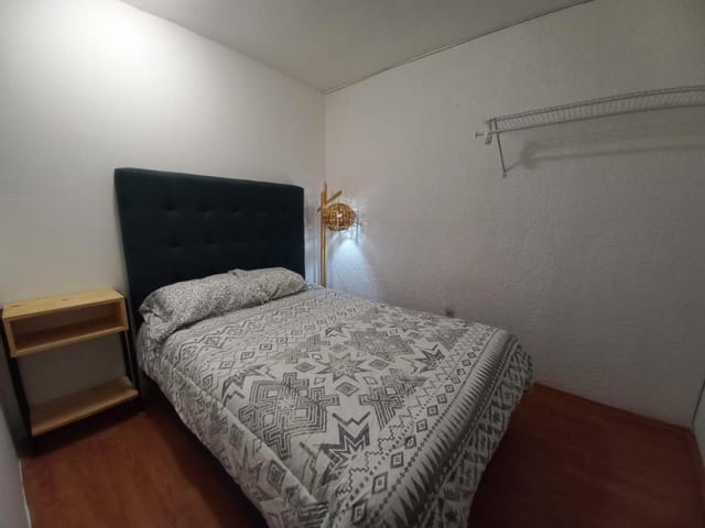 Minimalist budget room in Lindavista, Mexico DF for affordable business travel and event lodging.