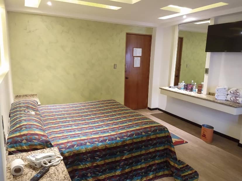 Triple room at Hotel Siesta del Sur: economy hotel lodging for budget travel and group bookings.