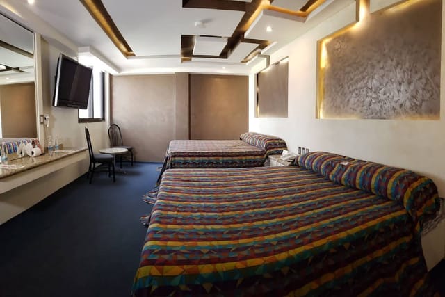 Standard double hotel room at Siesta del Sur for business travel and corporate accommodation.