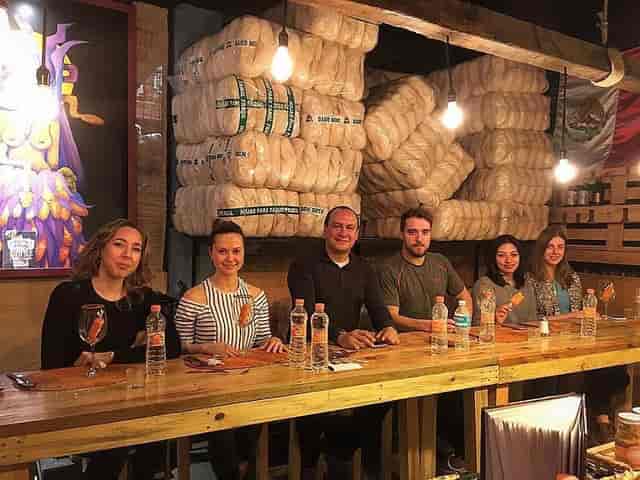 Rustic industrial tasting room for intimate team dinner or corporate workshop at La Flor de Jamaica.