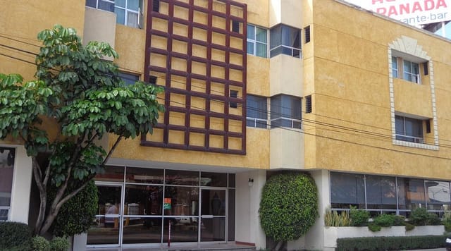 Budget-friendly Hotel Granada restaurant facade for corporate meetings and local events.