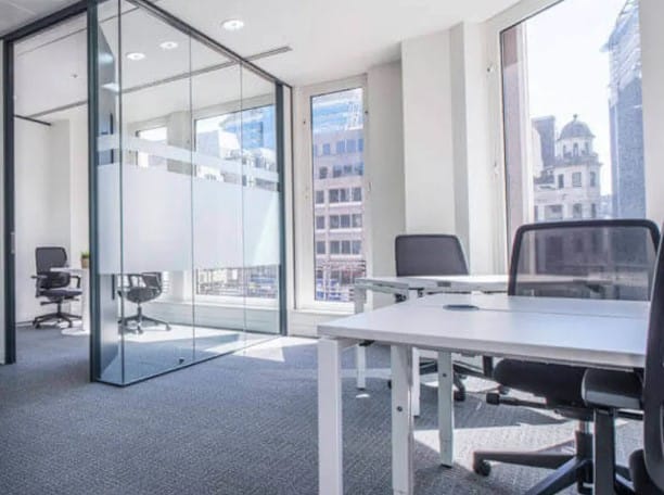 Virtual office rental in Spaces Revolucion, bright meeting room for agile team breakout sessions.