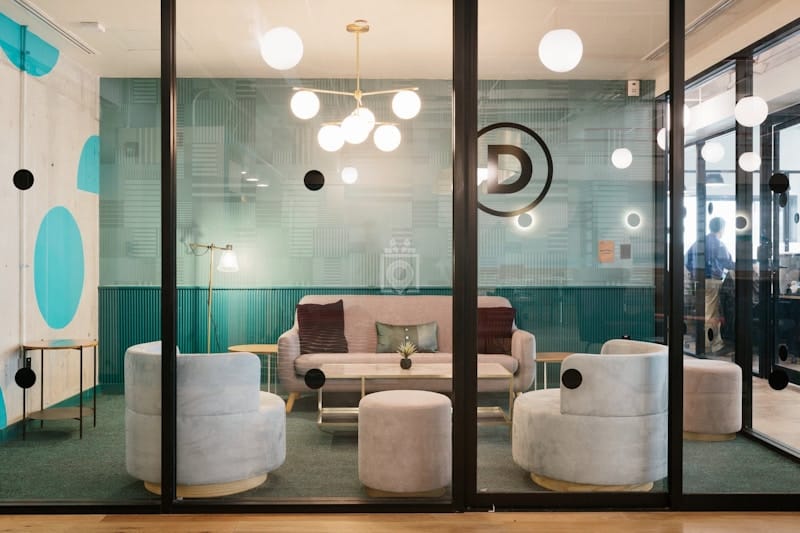 Modern breakout room at Miguel de Cervantes 169 for corporate collaboration and office meetings.
