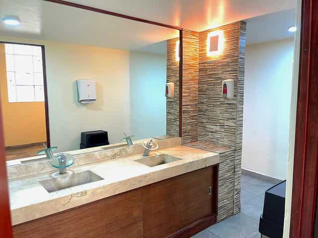 Empty soap dispensers in Terraza La Plaza banquet hall restroom, event venue maintenance issue.