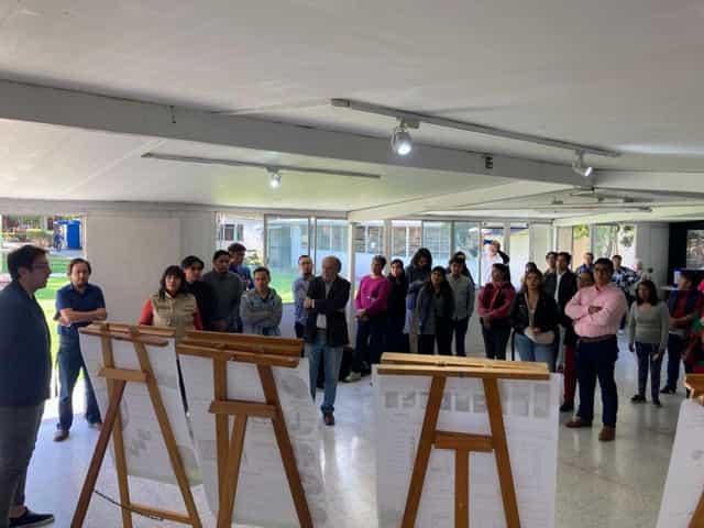 Informal gallery walk workshop at Casa de Las Bombas cultural center for collaborative events.