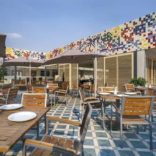 Upscale outdoor terrace at Dawat Restaurant for corporate networking and breakout event sessions.